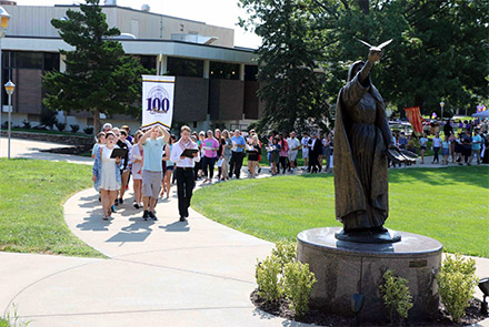 Students walking in unison on campus